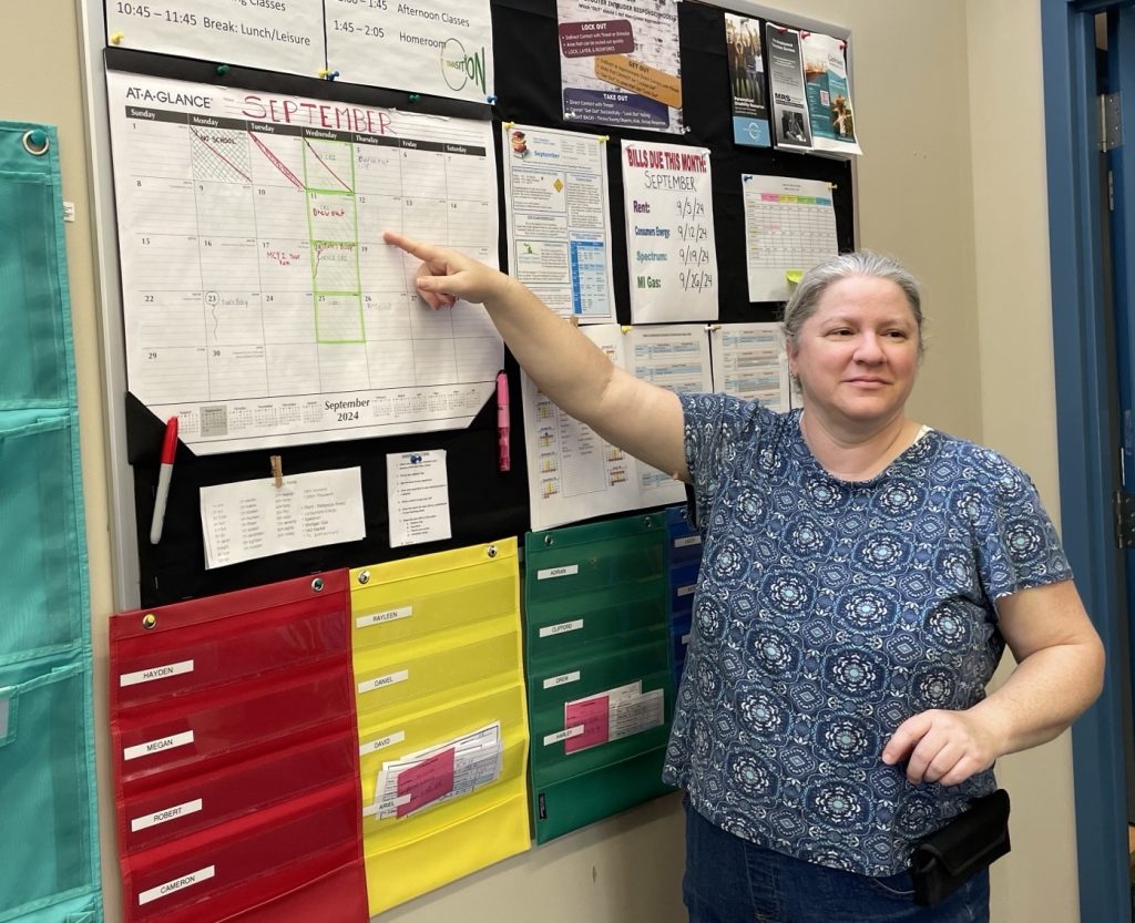 Crystal Boddy, Apprentice Teacher at Allegan Area ESA, shows off her classroom schedule.