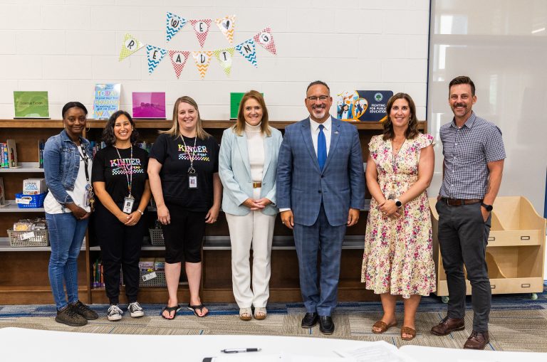 From left to right: Teia Johnson, Sarah Al-Kabour, Jennifer Fortner, Superintendent Dori Leyko, Secretary Cardona, Jamie Harbin, Calvin Smothers