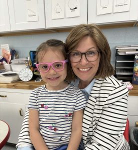 Lisbeth and student smiling in classroom