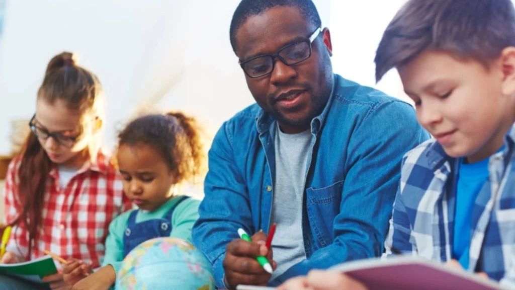 Teacher helping student with homework