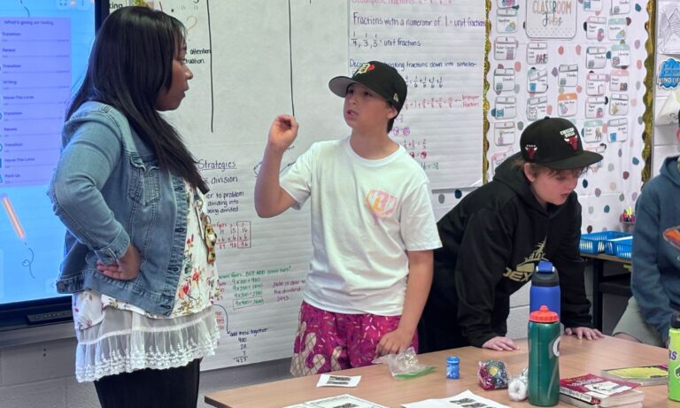 Donille working with students