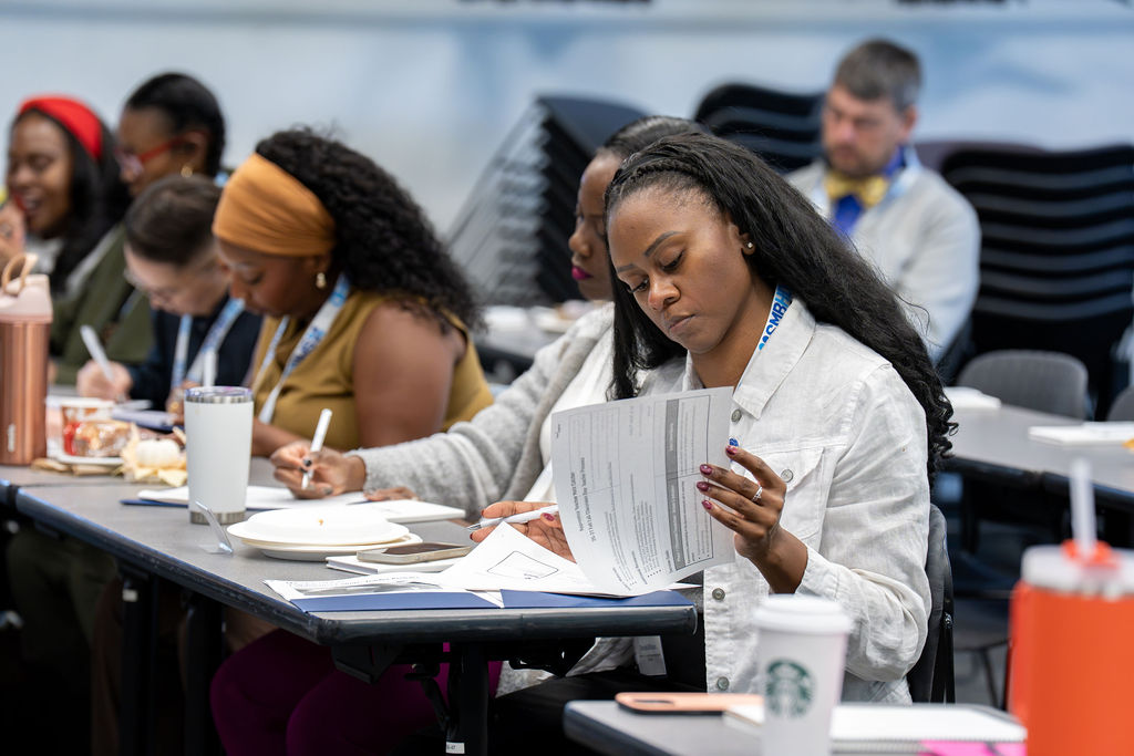 Student looking at a book