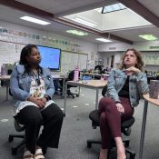Donille and Betsy Donille and Betsy talking in her classroom