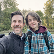 Calvin Smothers and Student standing before school starts